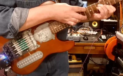 Guitarist creates a string-picking robot
