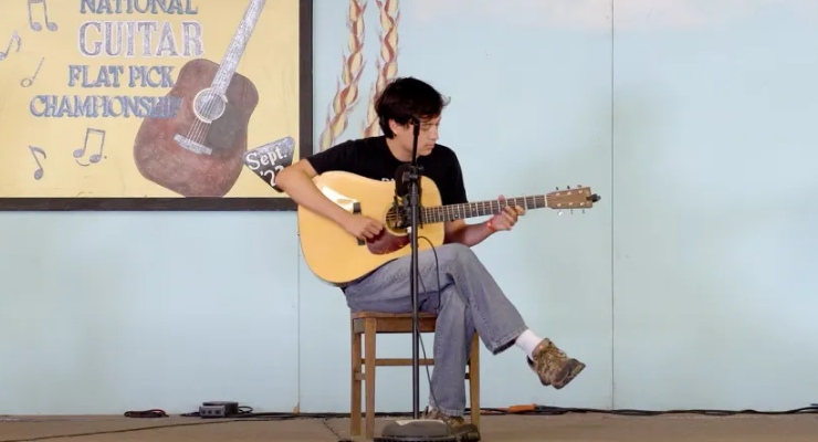 Watch bluegrass guitarist Ian Ly become the 2023 US National Flat-picking Champion