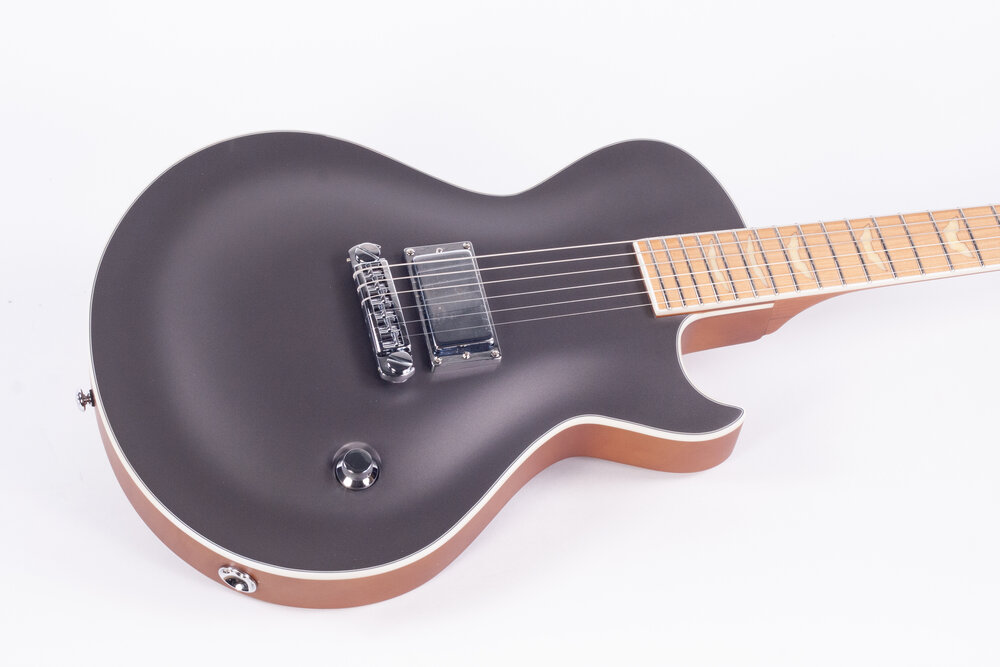 Is The Mid-Priced Electric Guitar An Extinct Species?
